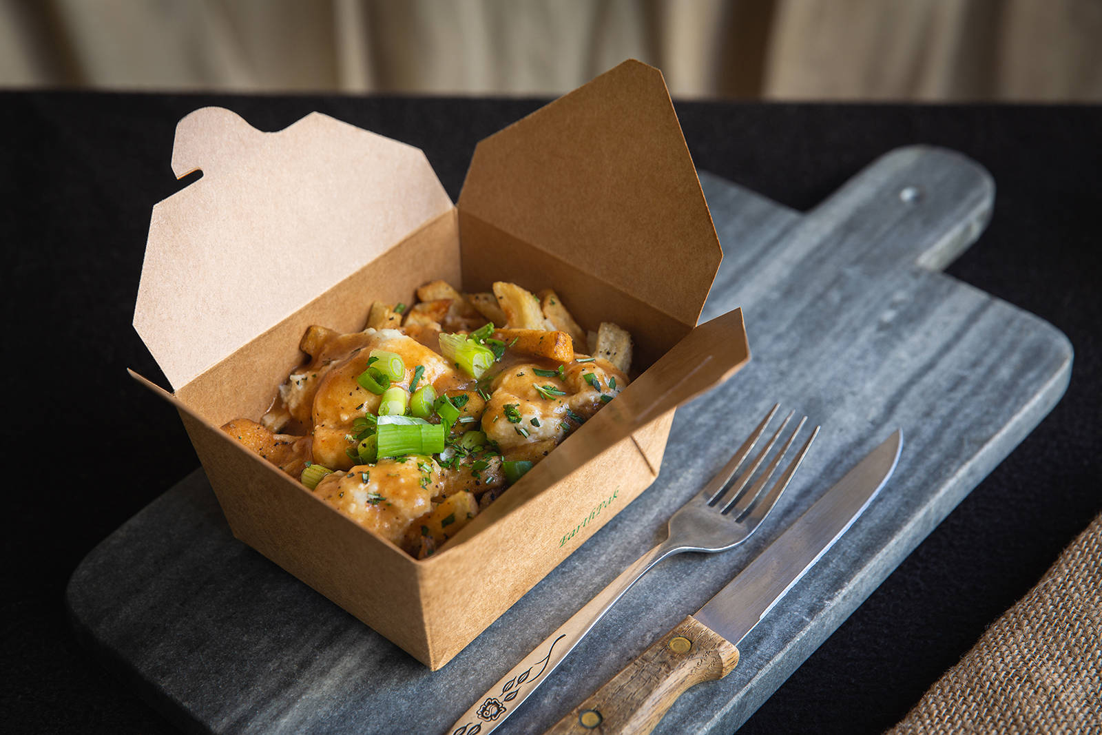 Dig in, guilt-free: This Poutine has Purpose!