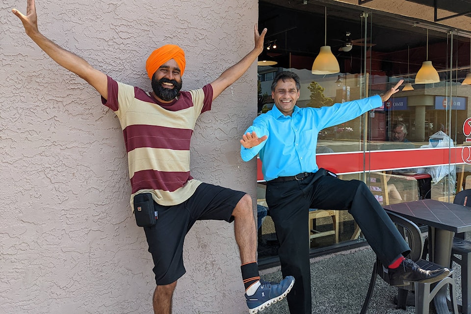 Gurdeep Pandher does a bit of bhangra dancing with Jess Birring at the 3rd Street Cafe in Sidney. The Sidney visit was the final stop on the Joy, Hope and Positivity Tour where the Yukon-based Pandher spread his love for the traditional dance of Punjab across Canada. Pandher has promised to visit Sidney again on next year’s tour and lead residents in bhangra dance. (Courtesy Michele Sealey)