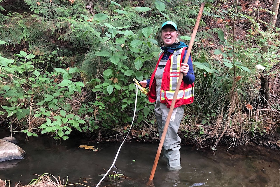 Katrina Adams, environmental support technician, is one of the two Peninsula Streams Society staff members assessing the state of Hagan and Graham Creeks as part of a month-long project that started on Aug. 17. (Carmen Pavlov/Submitted)