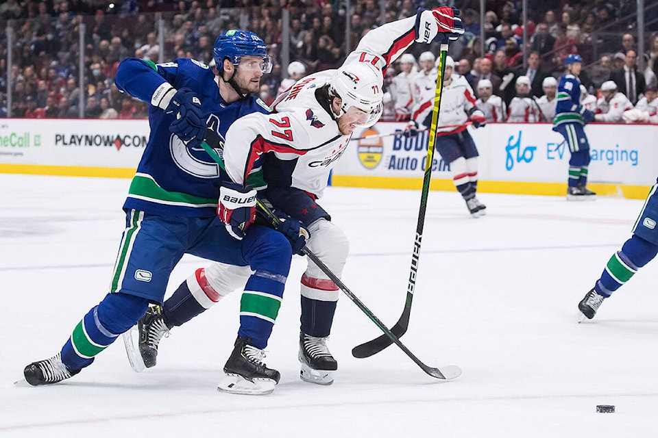 28443163_web1_220311-CPW-Canucks-Caps-caps_1