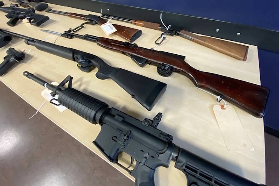 Eight rifles and a handgun were seized from Greater Victoria residences on March 15 as part of an investigation into suspected drug traffickers. (Photo courtesy of VicPD)