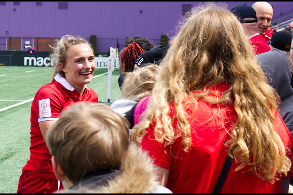 Krissy Scurfield greets young fans after a game during the HSBC Women’s Sevens Series tournament in Langford. (Bailey Moreton/News Staff)