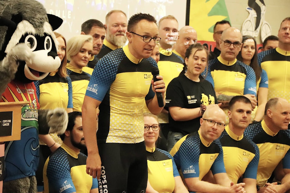 Tillicum elementary principal Jeff Duyndam, introduced as part of the 2022 Tour de Rock riders team, gets his students going at the launch event Friday, May 6. (Don Descoteau/News Staff)
