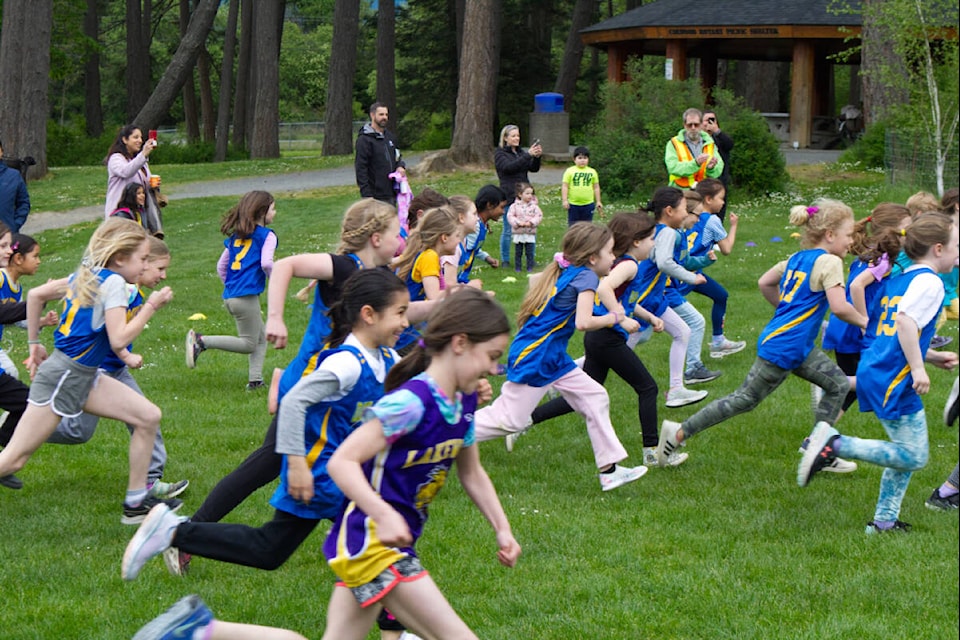 And they’re off! Grade 2 students start running during a cross-country race held at the West Shore Park and Recreation’s Juan de Fuca Lower Park in Colwood on May 12. (Bailey Moreton/News Staff)