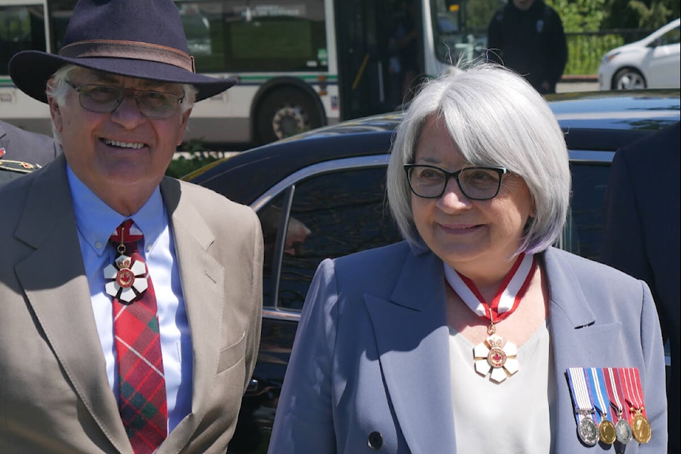 Gov.-Gen. Mary Simon and husband Whit Fraser exit their vehicle procession at the legislature grounds on Friday, May 20. (Evert Lindquist/News Staff)