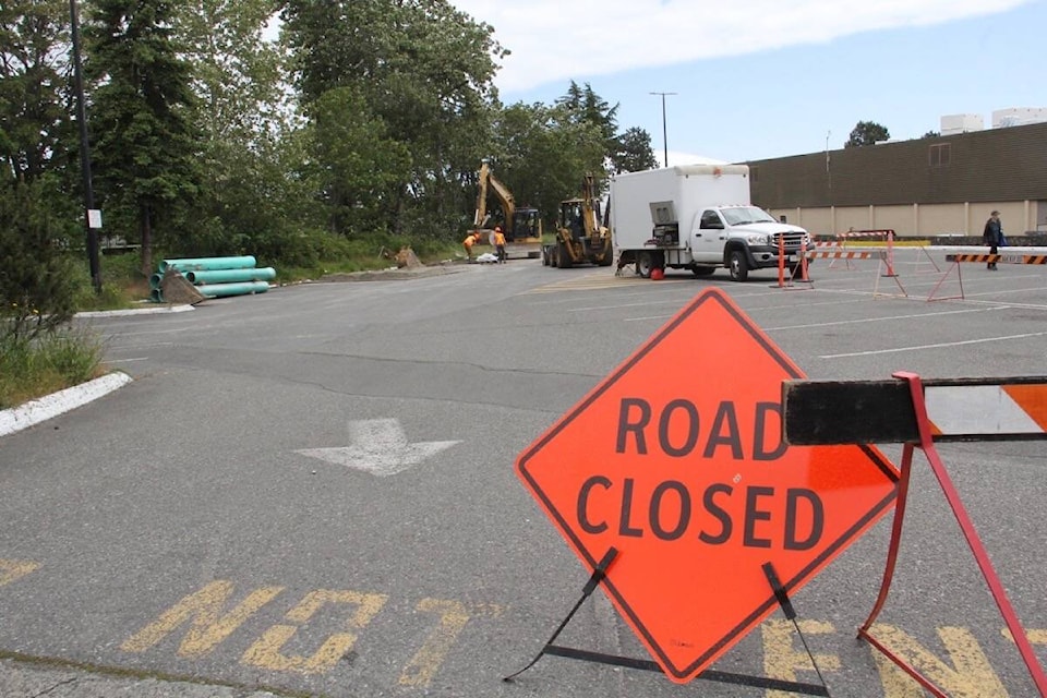 Repairs are underway to the Bowker Creek bank collapse adjacent to the Oak Bay Recreation Centre. (Christine van Reeuwyk/News Staff)