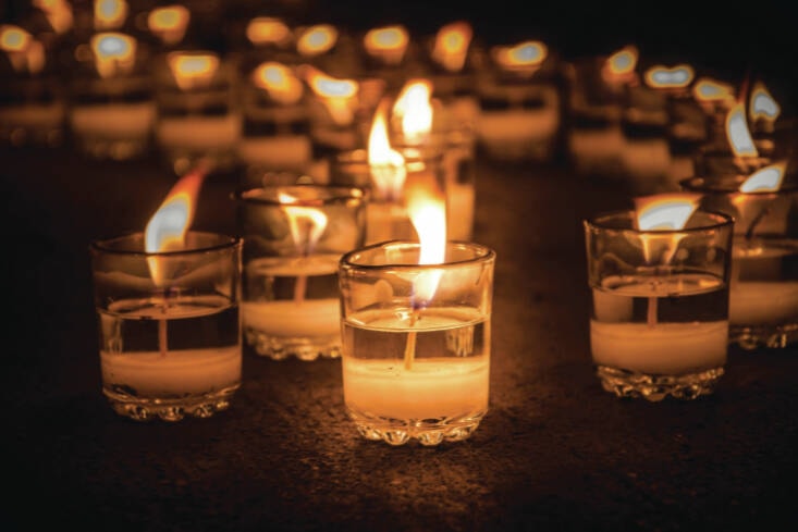 30015974_web1_220811-SNM-Candlelit-Vigil-file_1