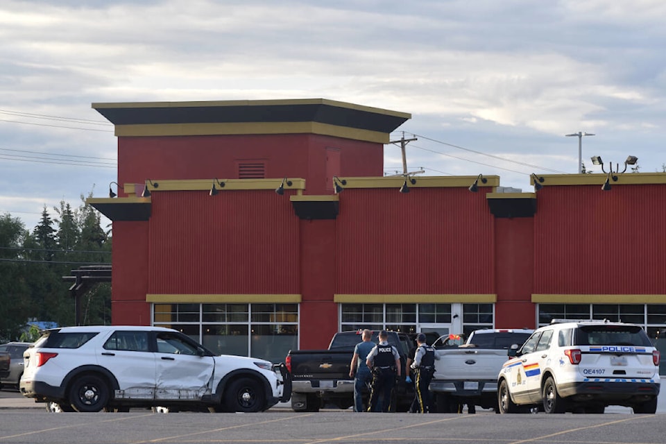Five men were arrested in a commercial parking lot off Newman Road Saturday, Aug. 27. (Rebecca Dyok photo — Quesnel Observer)