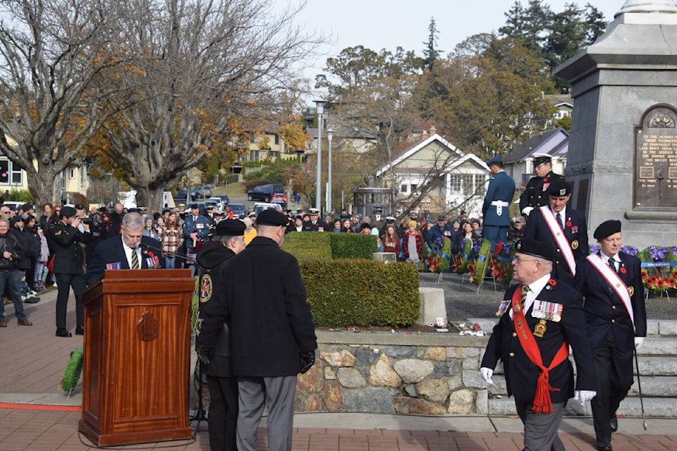 Wreaths ornamented with poppies are laid at the cenotaph at Memorial Park during Esquimalt’s Remembrance Day ceremony on Friday (Nov. 11) morning. (Austin Westphal/News Staff)