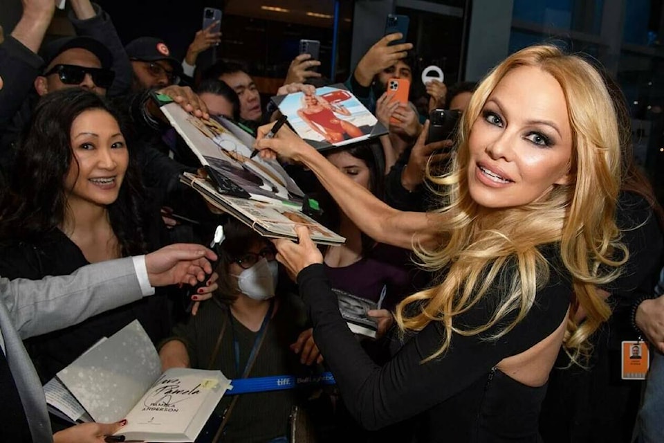 Vancouver Island icon Pamela Anderson holding book signing