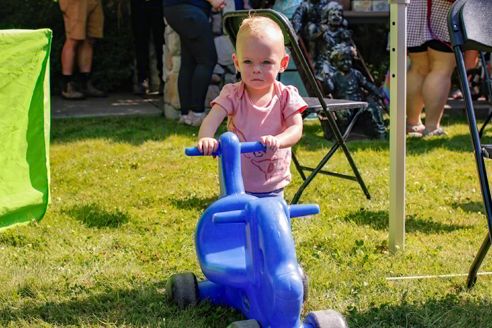 Pippa, a former patient of the Victoria General Hospital NICU, pushes a toy at the NICU Reunion on Aug. 8.