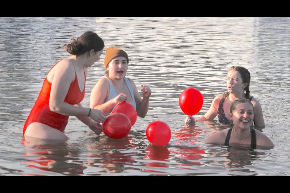 New for this year's Winterfest was a Polar Plunge in Christina Lake, hosted by the Big Effort Swim organizers. A few braved the chilly waters of the lake to retrieve balloons with prize numbers in them, with Washington State residents Meagan Hyzer, left, Chloe Stelly, Madison Frazier and Olivia McQueen taking the plunge, as well as a few selfies after getting out. 