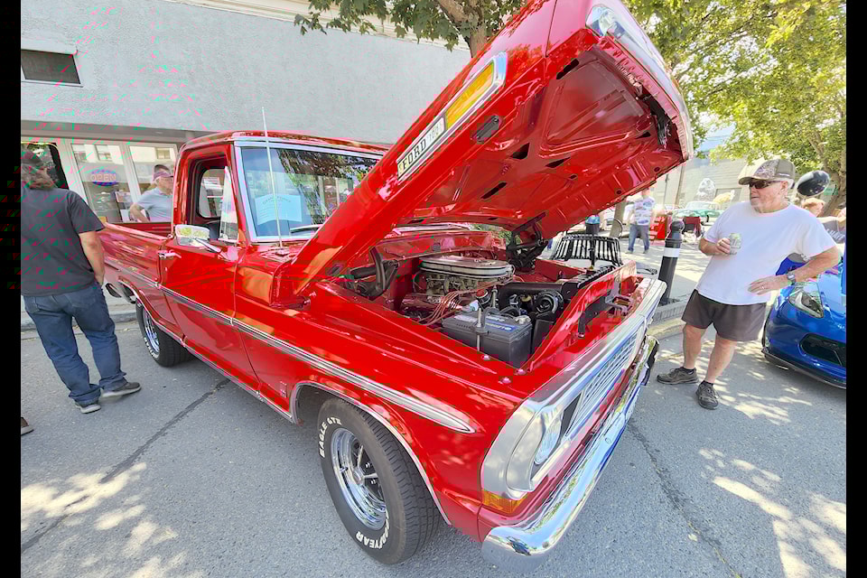 Bright colours and big engines were all on display, with a Ford 100 pickup's engine block being shown off 