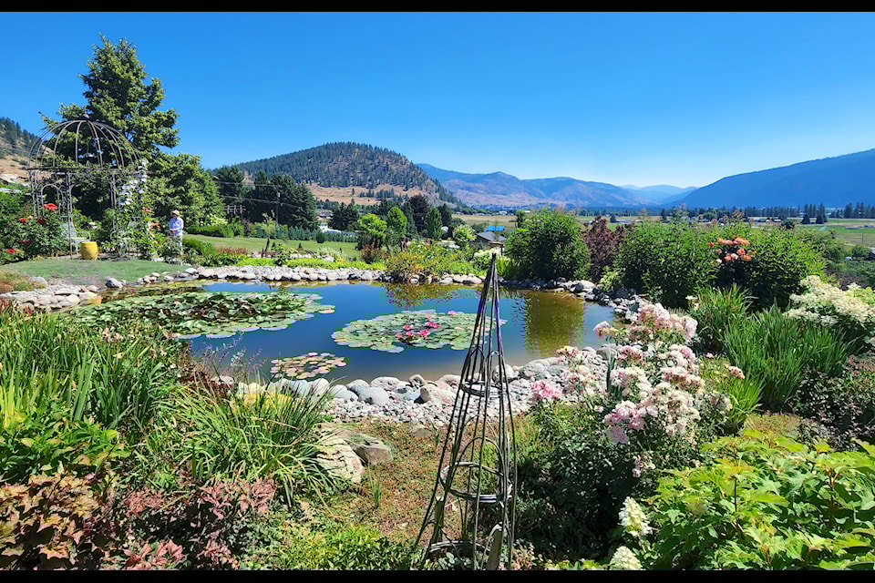 The sprawling gardens of Norm and Bonnie Chapman's Spencer Road acreage already has commanding views of the valley, but also had several small flower and fruit tree gardens for people to tour, including a large pong, several hidden alcoves, repurposed hops towers and even a grape trellis.