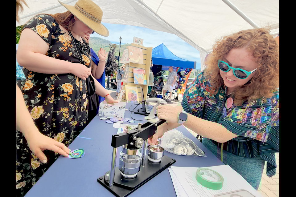 The Grand Forks and District Public Library set up an outdoor branch, with Pride-themed books, crafts and a button-making station.