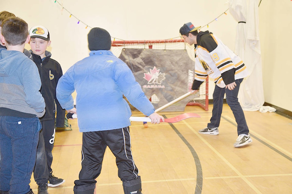 Some of the Bruins were on-hand to give the students pointers on their shots.