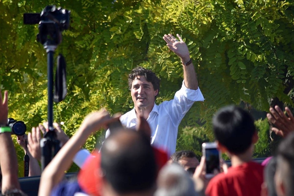 13021723_web1_180805-NDR-M-Trudeau-in-Delta-waving-bye