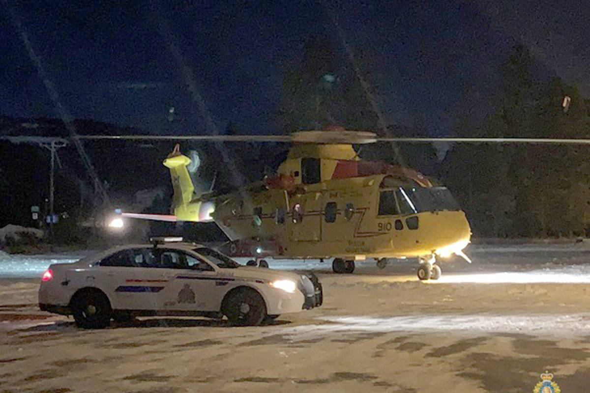 An RCMP cruiser looks on as military search and rescue helicopter powers down outside Bridesville Tuesday night, Dec. 1. Photo courtesy of RCMP Cpl. Jesse ODonaghey