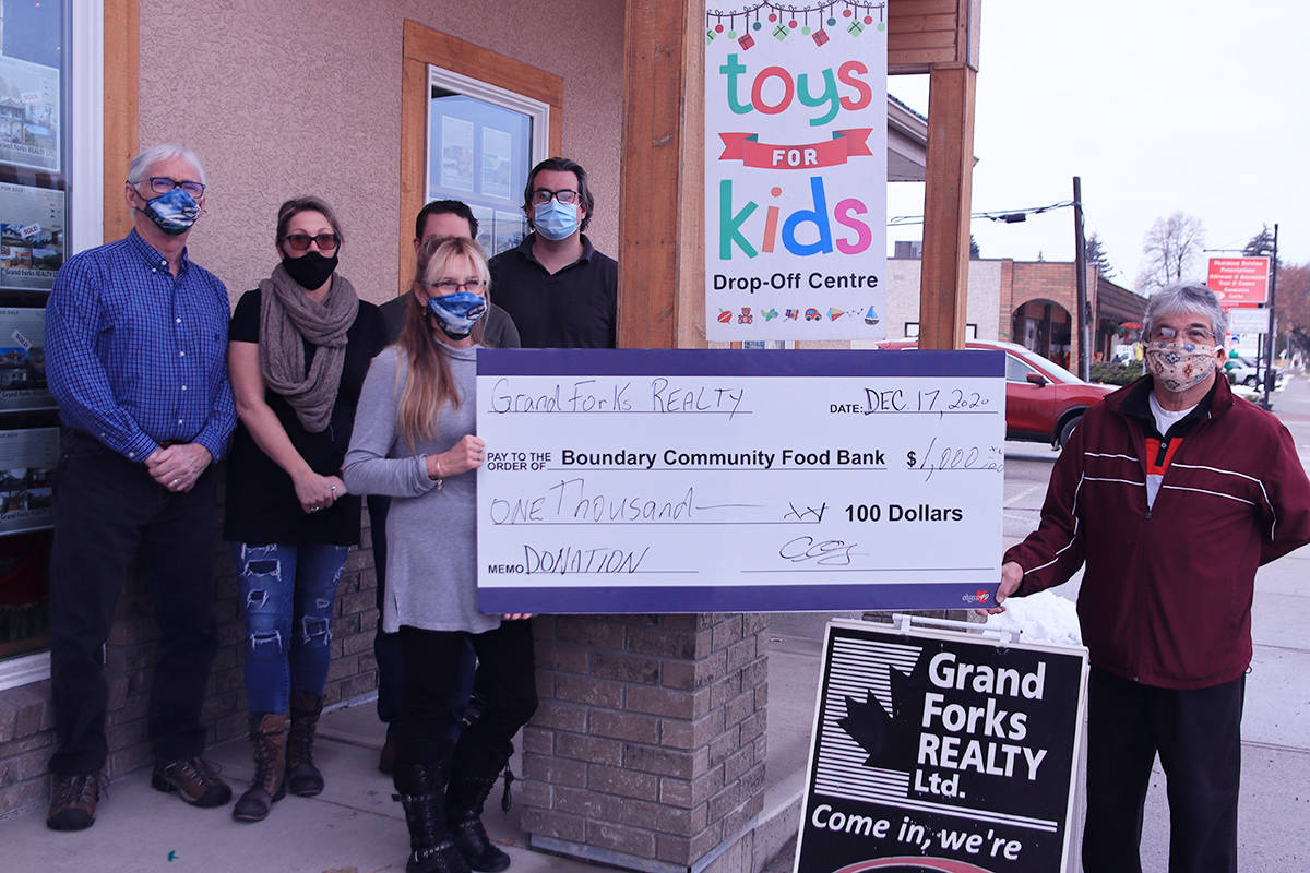 Grand Forks businesses donate thousands to food bank Grand Forks Gazette