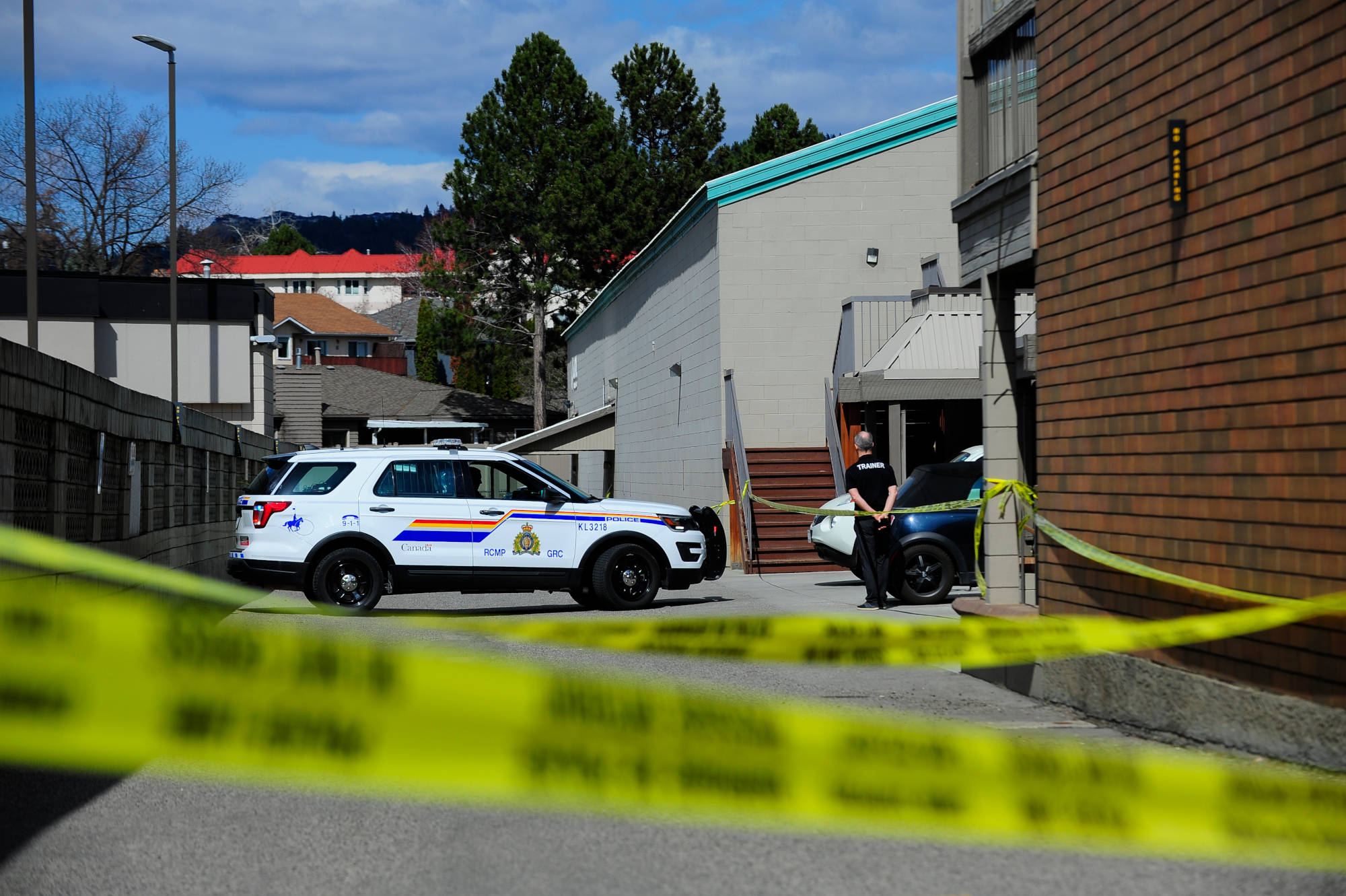 RCMP cruisers on scene at Global Fitness in Kelowna after a shooting on the morning of March 29, 2021. (Michael Rodriguez/Capital News)