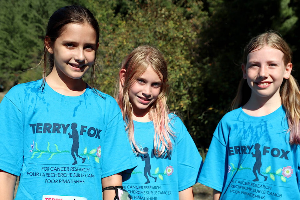 (L-R) Christina Lake Fifth-graders Emma Irwin, Maddison Winterburn and Rachel Marks made good time on Thursday’s run. Photo: Laurie Tritschler