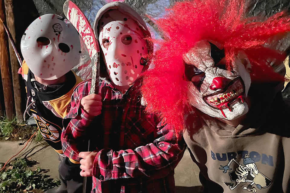 (L-R) Little hellions Buck McIver, Jake Katasonoff and Alexi Pankoff were creepily costumed when they took on the Haunted Cedar Maze Friday, Oct. 29. Photo: Laurie Tritschler