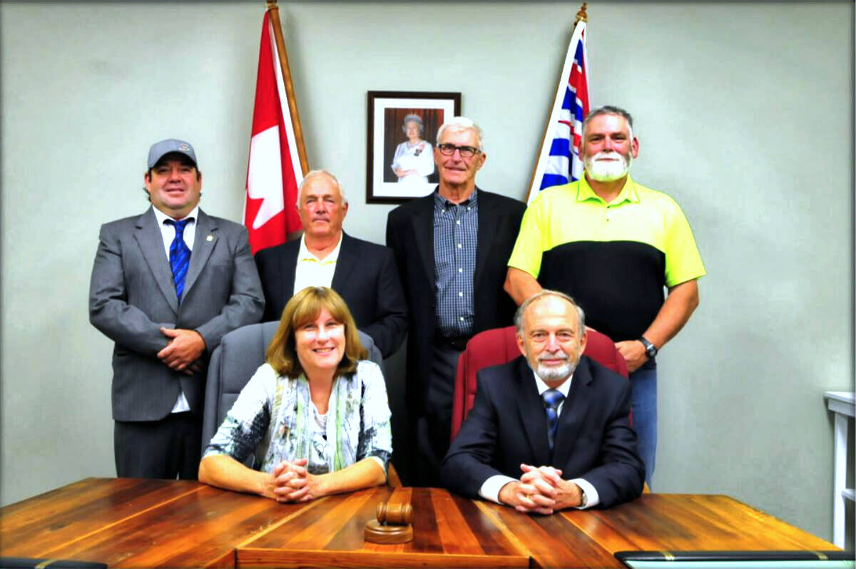 Front: L-R) Penny Feist, Chief Administrative Officer at the Village of Midway sits next to Mayor Martin Fromme. In behind, from left to right, are Couns. Darrin Metcalf, Gary Schierbeck, Richard Dunsdon and Fred Grouette. Photo: midwaybc.ca
