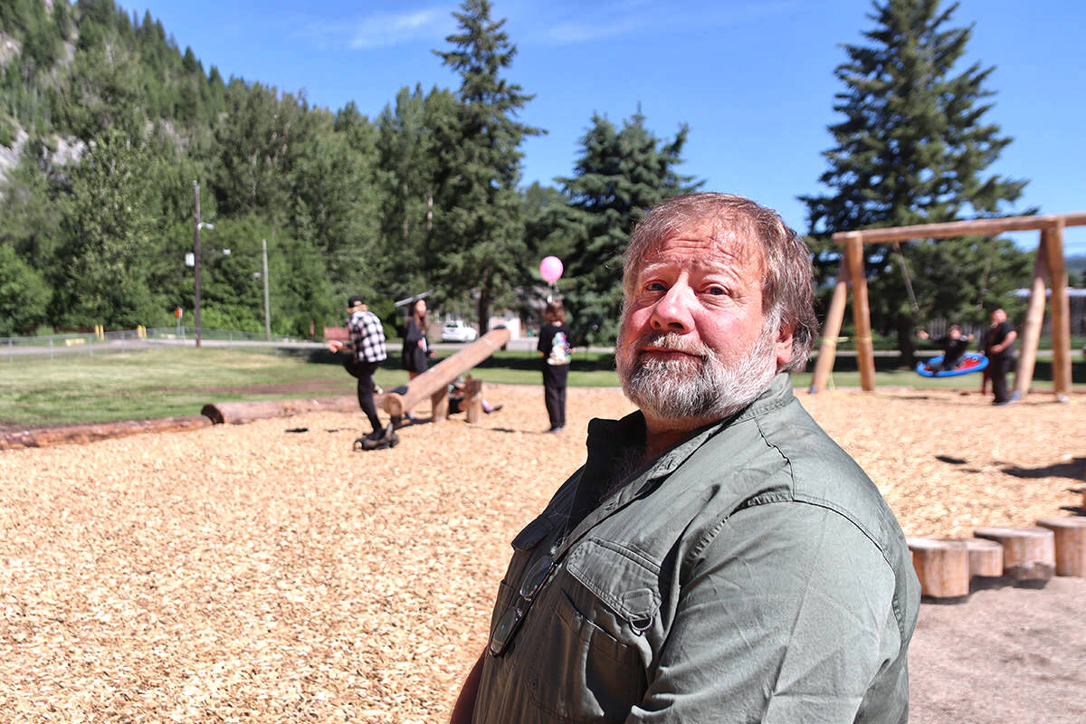 Greenwood Mayor Barry Noll poses for a photo as Greenwood Elementary School kids play at the citys Lions Park on June 17, 2021. Photo: Laurie Tritschler