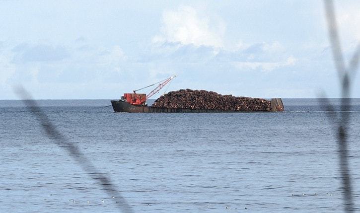 Andrew Hudson photo
A log barge heads up the east coast of Haida Gwaii.