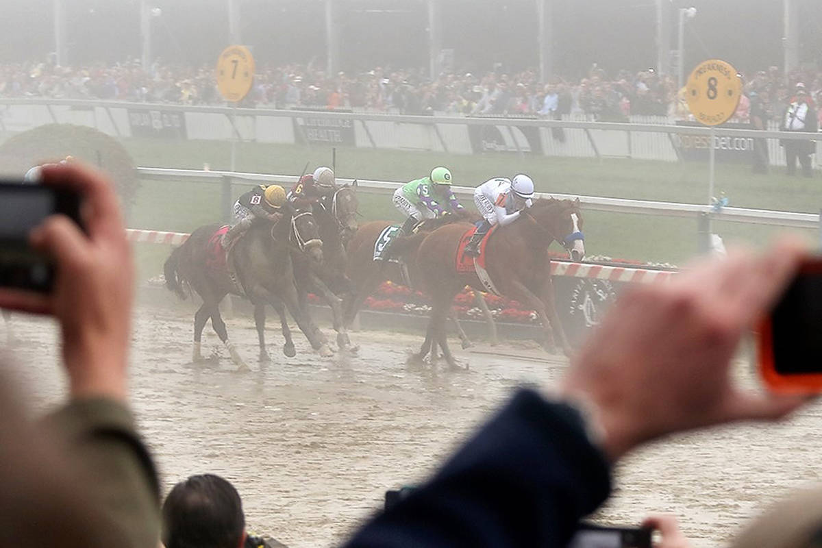 12297634_web1_1800612-LAT-SPORTS-Justify-wins-Preakness