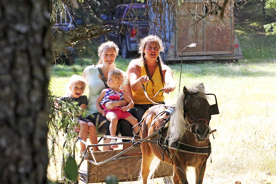 Cyndi Bird and Tonka the pony gave families a thrilling ride through the woods. (Andrew Hudson/Haida Gwaii Observer)