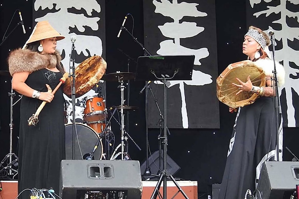 Yahguudans: Erika Yahguujaanas Stocker and Raven Anne performing Haida songs and oral history. (Archie Stocker Sr. / Haida Gwaii Observer)