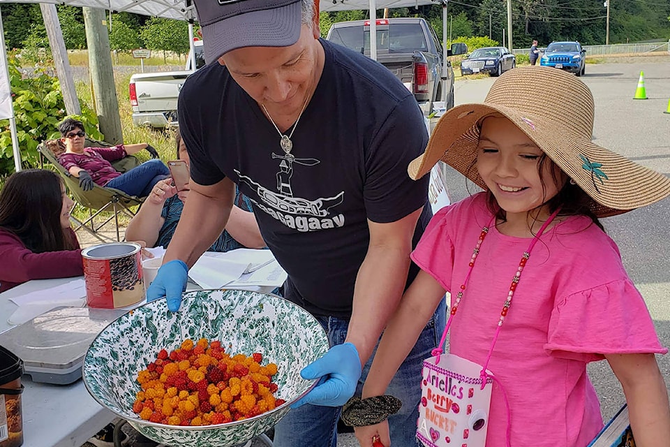 Billy Yovanovich, chief councillor for the Skidegate Band Council, is pictured along with Arrielle Yovanovich-Allick at the first-ever Salmonberry Picking Contest on Sunday, June 28, 2020. (Billy Yovanovich/Submitted photo)
