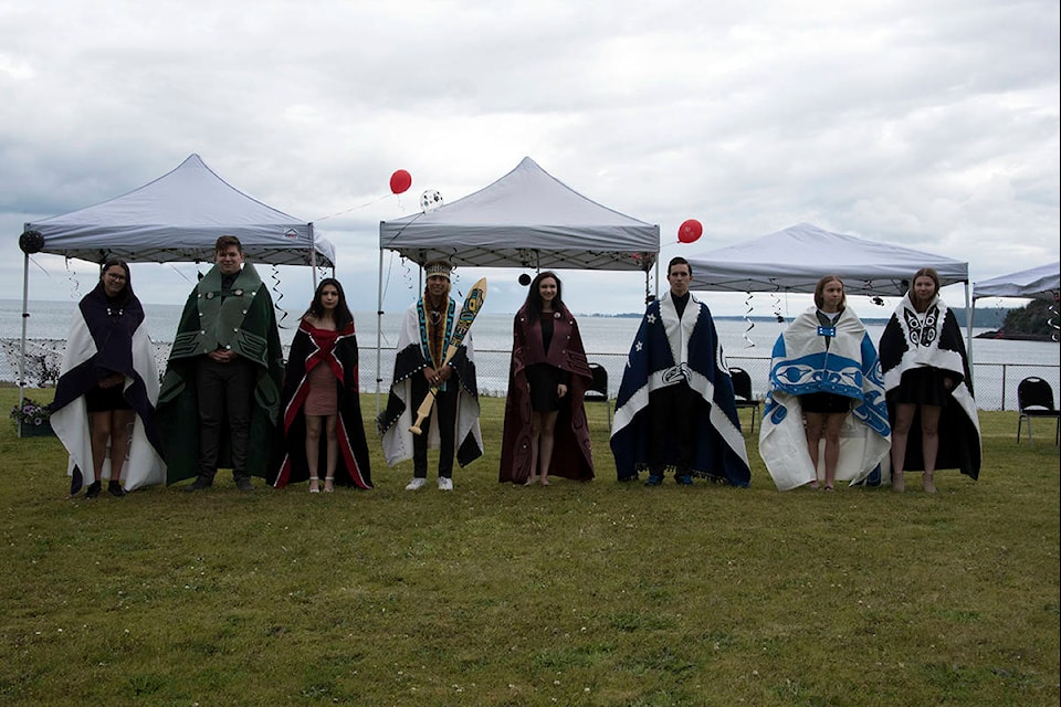 The Skidegate Band Council celebrated graduates of 2020 on Saturday, June 27 with a button blanket ceremony that included Haida singing, drumming and speeches. The custom-made button blankets that were presented to the graduating students are pictured in this submitted photo. (Roberta Aiken/Byrds Eye View Photography)