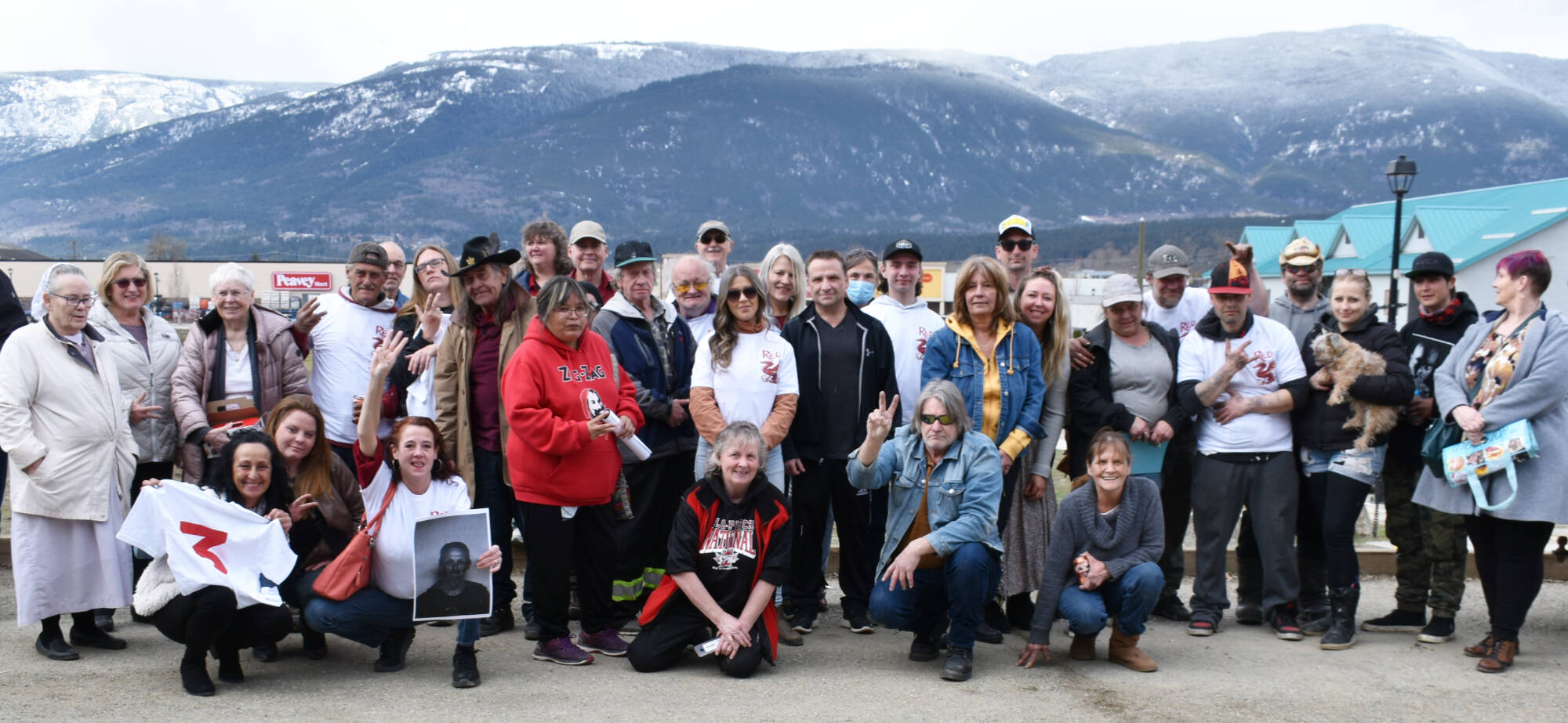Some members of the group of people who attended the memorial for Rob Konkle on April 1, 2023 in Salmon Arm pause for a photo. (Martha Wickett-Salmon Arm Observer)