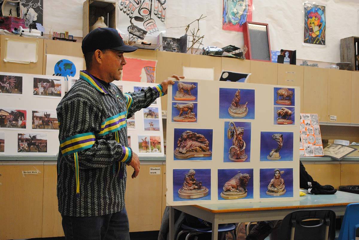 Okanagan sculpture artist Smoker Marchand presents to the Indigenous Art Studio class at Mount Boucherie Secondary School. (Photo courtesy of Jim Elwood)