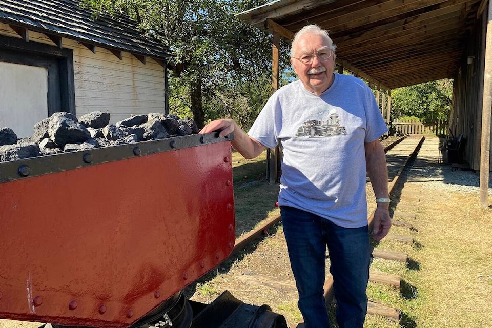Ron Jeskey says he started building a train at the BC Forest Discovery Centre in reverse, starting with the little red metal dump car that originally came from Mount Sicker Mine. For the full story, see page 3. (Chadd Cawson/Citizen)