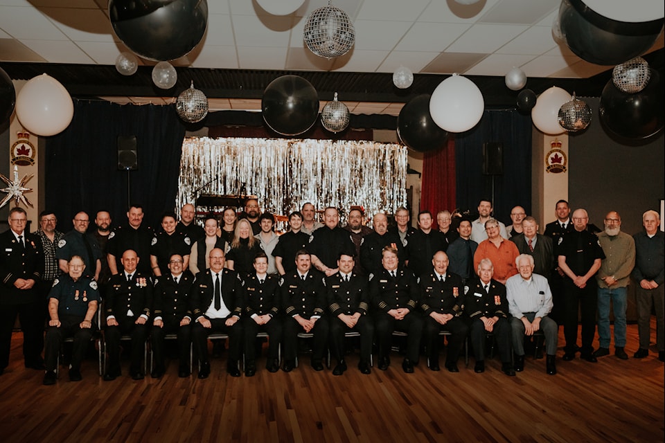Members of the Hope Fire Department, both current and former, during the Hope Fire Department's 25th anniversary on March 8. 