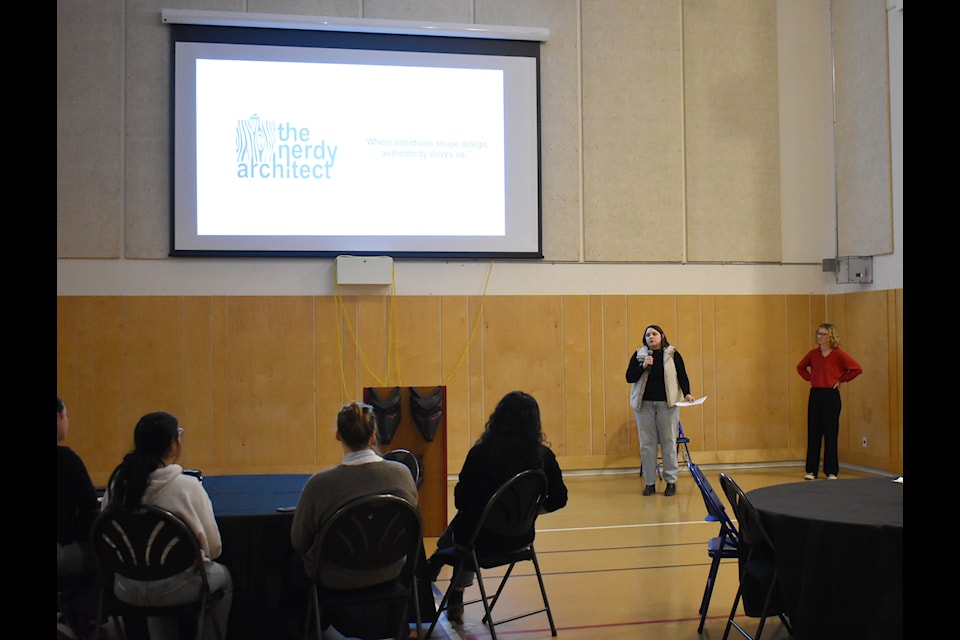 Chelsea Mueller, the owner and lead architect at The Nerdy Architect Inc., provides information on her portion of the 31-unit housing project for Chawathil First Nation during the open house on April 19. 