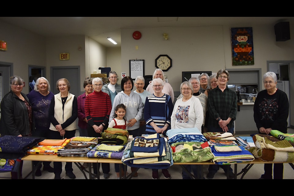 The Hope quilters donated 25 quilts and pillow cases to Camp Skylark on March 19. 