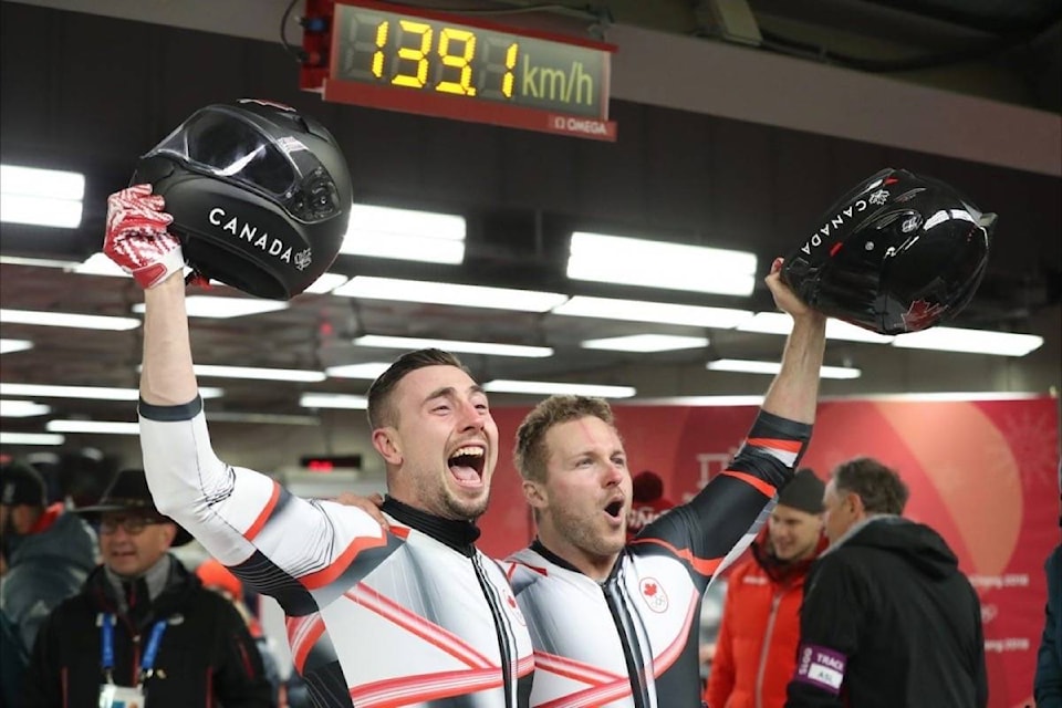 Team Canada’s Justin Kripps and Alex Kopacz celebrate their gold medal in the men’s two-man bobsleigh event at PyeongChang 2018 (David Jackson/COC)