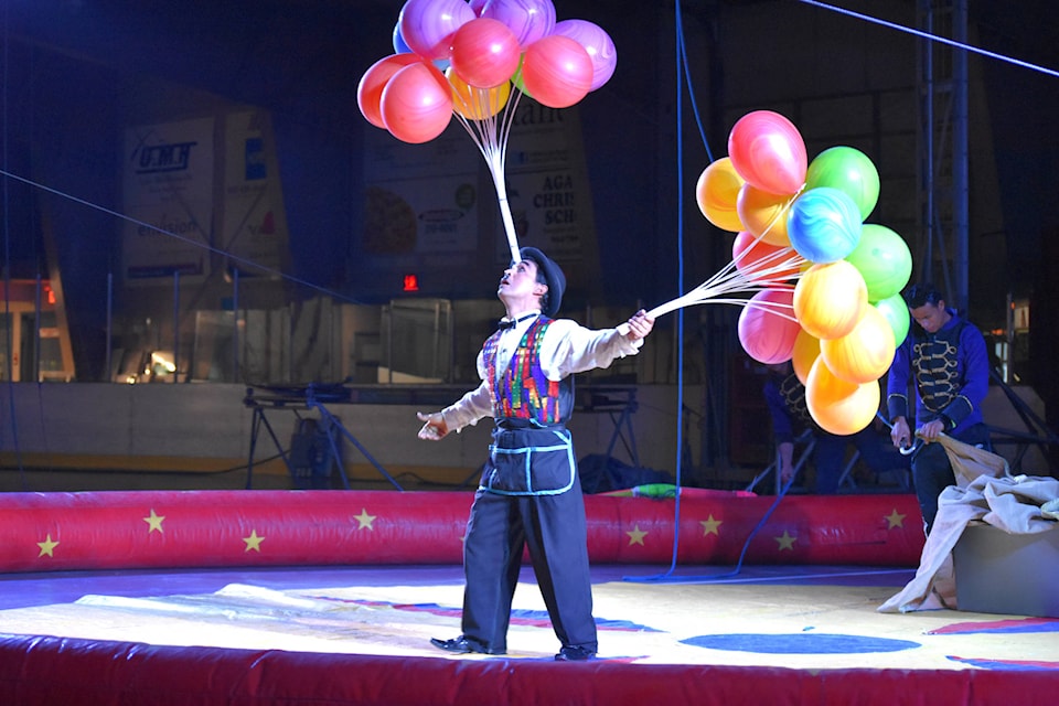 The Great Benjamin Circus made a stop in Hope Tuesday evening, delighting youngsters and their families with balloon tricks, dancing, hula hoop tricks and a grand finale involving a trapeze artist throwing himself several metres into the air. Emelie Peacock/Hope Standard