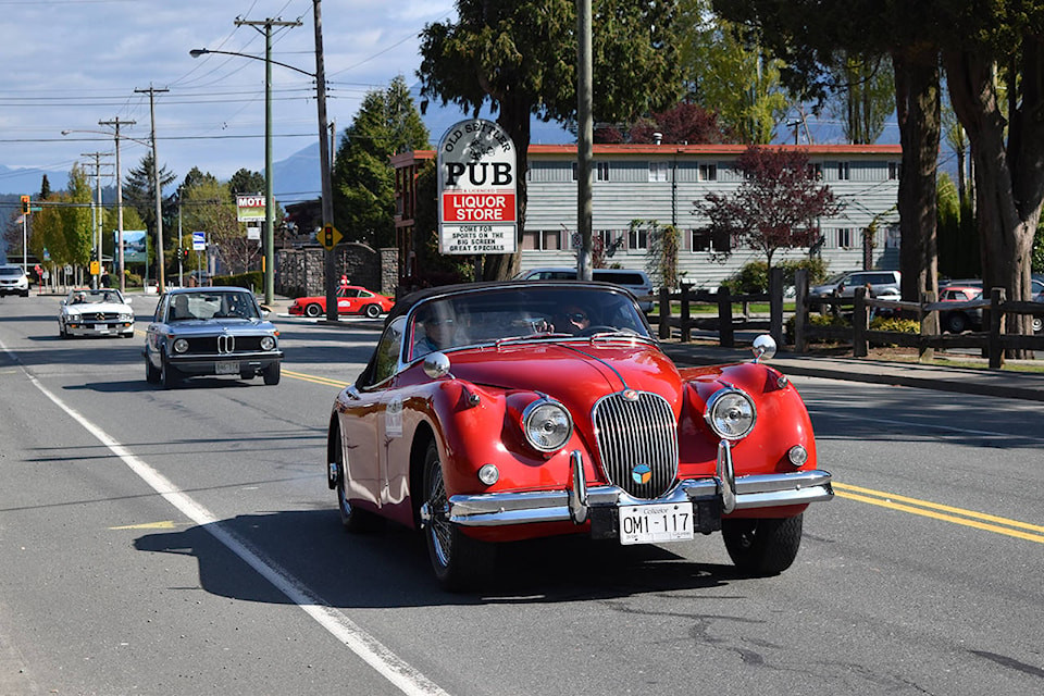 Classic cars from the 2019 Spring Thaw Rally head down Harrison Hot Springs Road on Friday, April 26. (Grace Kennedy/The Observer)