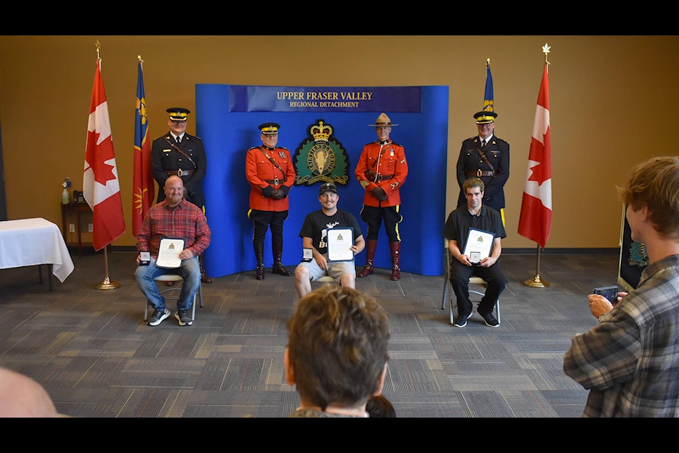 Front row from left are the recipients of the RCMP’s Officer In Charge awards for valour Steven Forde, Kenneth Reid and Craig Fraser. Missing from the photograph, also honoured with this award, are Taylor Plett and Rachel Prest. (Emelie Peacock/Hope Standard)
