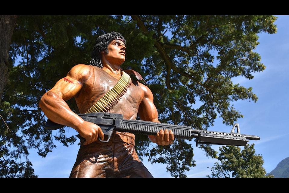 Hope’s first chainsaw carving of John J. Rambo, in red cedar, is installed at Memorial park on Aug. 14, 2020. (Emelie Peacock/Hope Standard)