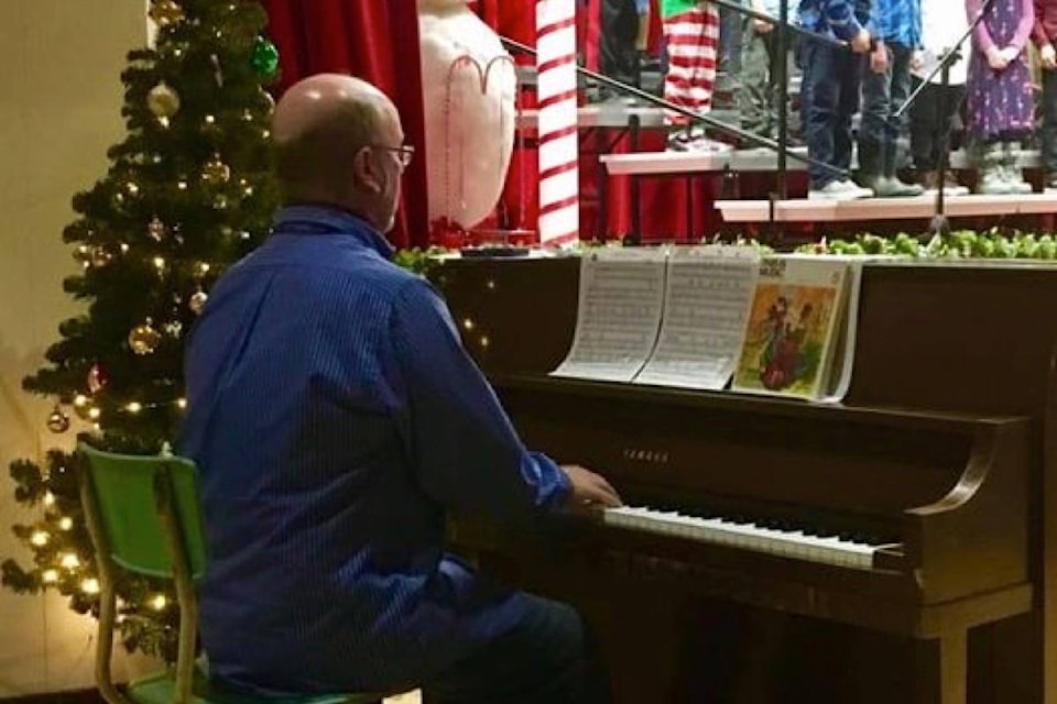 Peter Flynn sits at the piano at a Christmas concert. Flynn retired at the end of 2020 and sat down with The Standard to reflect on his long career in the Hope area. (Photo/Peter Flynn)