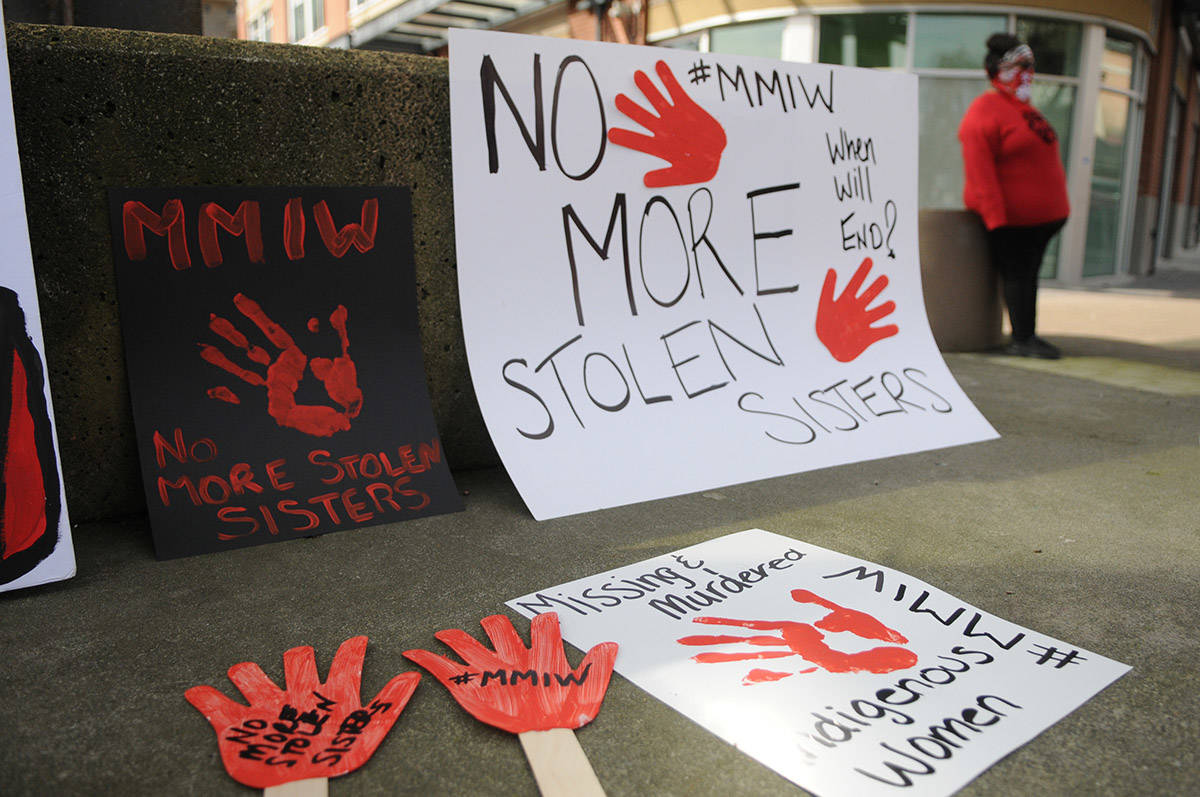 About 30 people gathered at Five Corners in Chilliwack on Saturday, March 13, 2021 for MMIW Takes Back Canada, a nationwide endeavour to draw attention to the issue of missing and murdered Indigenous women. (Jenna Hauck/ Chilliwack Progress)