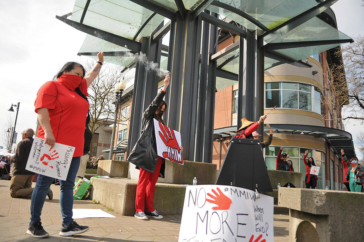 About 30 people gathered at Five Corners in Chilliwack on Saturday, March 13, 2021 for MMIW Takes Back Canada, a nationwide endeavour to draw attention to the issue of missing and murdered Indigenous women. (Jenna Hauck/ Chilliwack Progress)