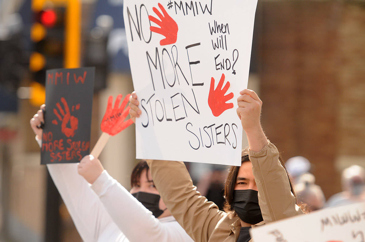 About 30 people gathered at Five Corners in Chilliwack on Saturday, March 13, 2021 for MMIW Takes Back Canada, a nationwide endeavour to draw attention to the issue of missing and murdered Indigenous women. (Jenna Hauck/ Chilliwack Progress)