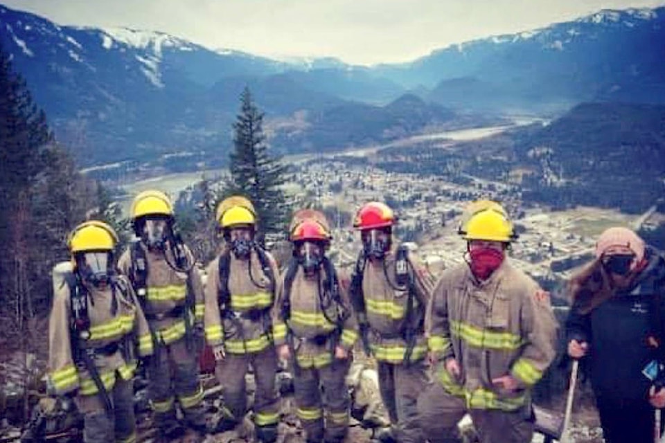 The Hope Fire Department Climb the Wall team poses at the top of the Hope Lookout trail, having finished an arduous hike with full firefighting gear to raise money for the B.C. Lung Association. (Photo/Hope Fire Department)